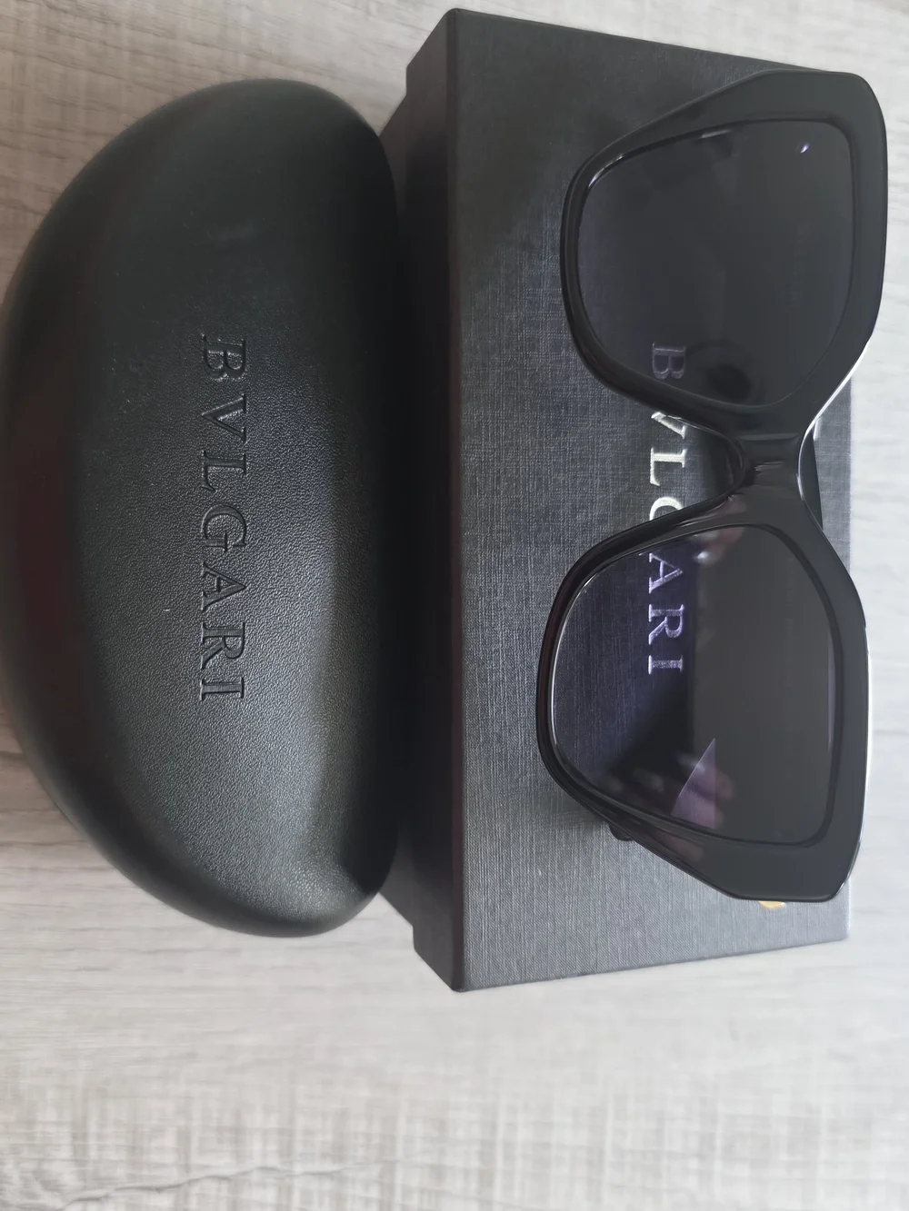 Bulgari Black Cat-Eye Sunglasses with Gold Accent